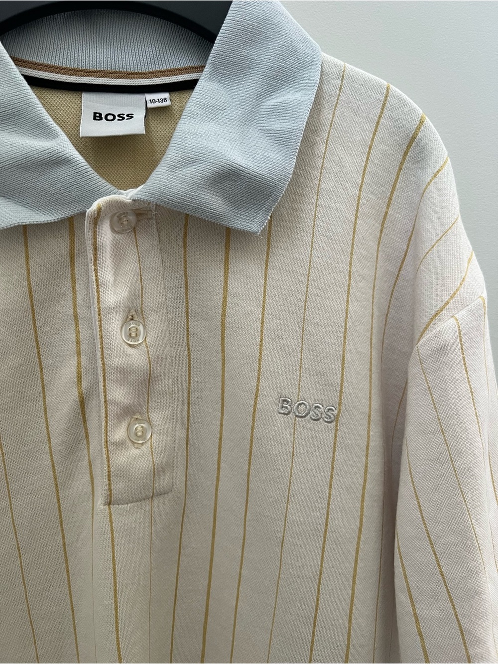 BOSS Kids Cream Polo with Gold Pinstripes and Light Blue Collar